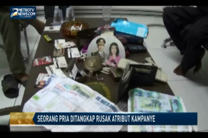 Seorang Pria Ditangkap Rusak Atribut Kampanye