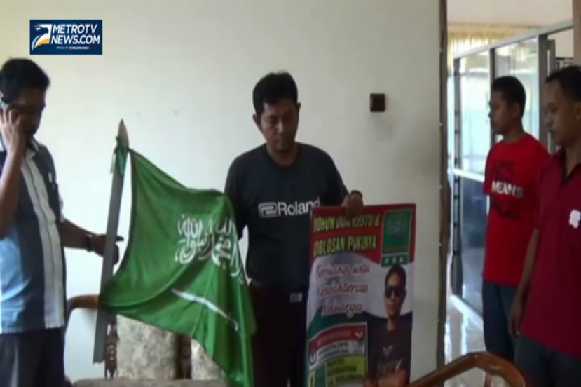 Pasang Banner Partai Berlambang AK-47, Guru Diciduk
