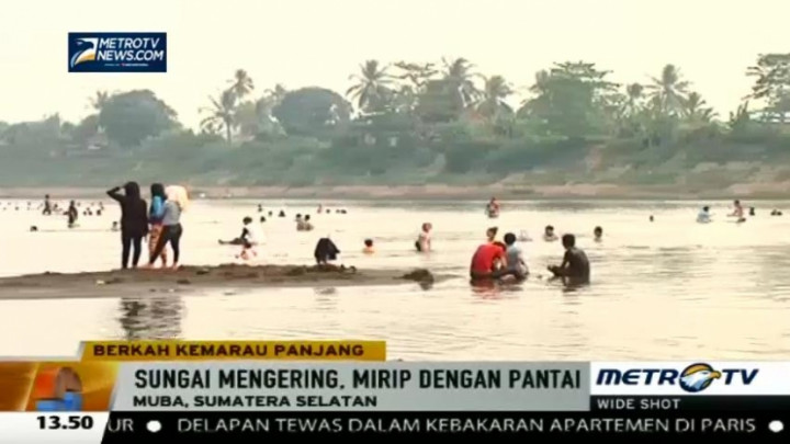 Mengering, Sungai Musi Jadi Lokasi Wisata Dadakan