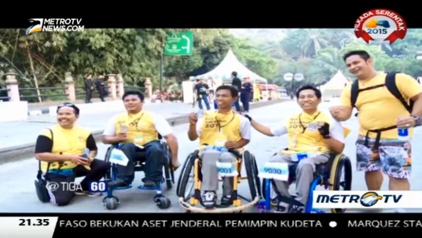 Keterbatasan Fisik Tak Jadi Penghalang Pria Ini untuk Marathon