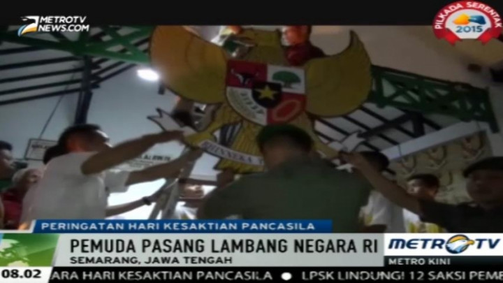 Peringati Hari Kesaktian Pancasila, Puluhan Pemuda Pasang Lambang Negara RI