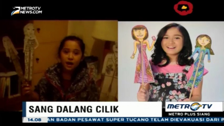 Michelle Kuhnle, Dalang Wayang Kertas Berusia 12 Tahun