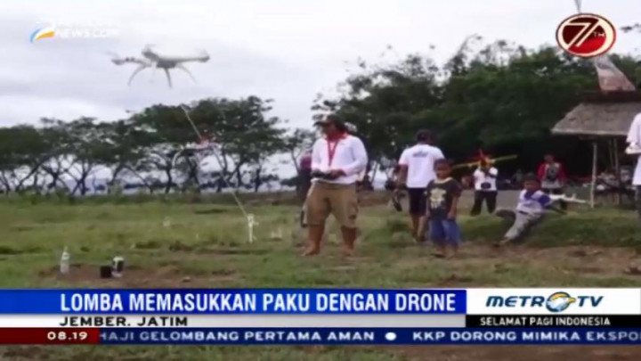 Lomba Unik Memasukkan Paku dengan Drone