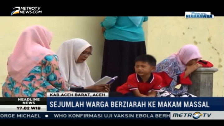 Warga Aceh Berziarah ke Makam Massal Korban Tsunami