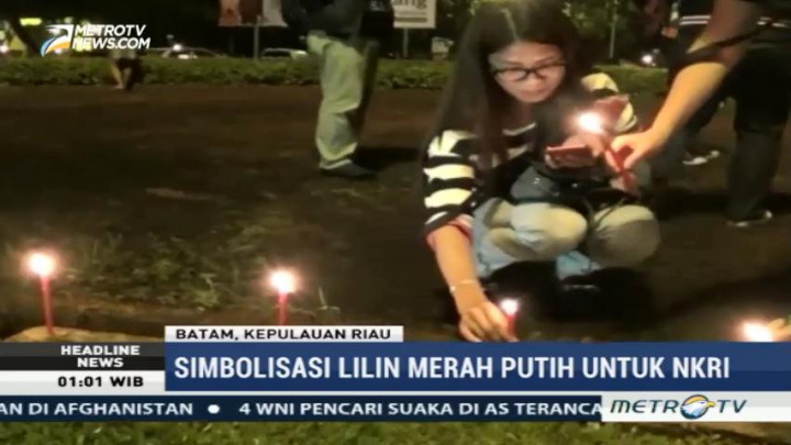 Simpatisan Ahok di Batam Nyalakan Lilin Merah & Putih