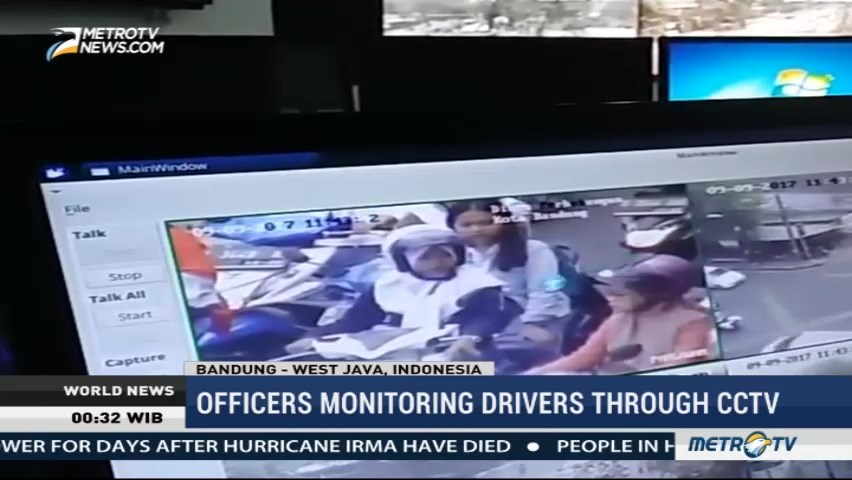 Officers Monitoring Drivers Through CCTV