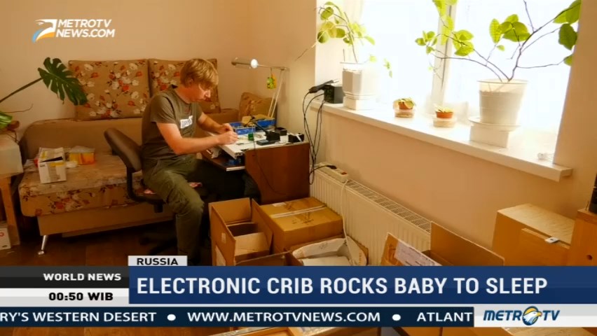 Electronic Crib Rocks Baby to Sleep