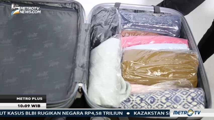 Tips Menata Isi Koper