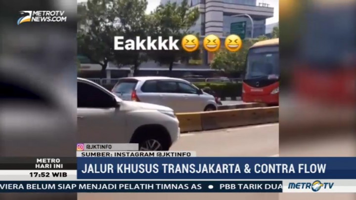 Viral, Mobil Dipaksa Mundur Bus Transjakarta