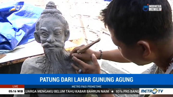 Pria Ini Manfaatkan Lahar Gunung Agung Jadi Patung
