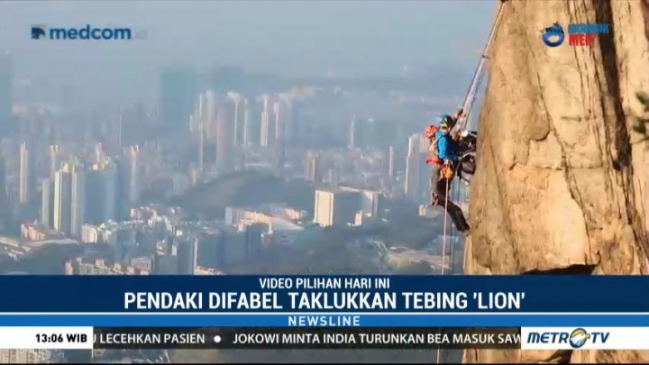 Pendaki Difabel Taklukan <i>Lion Rock</i> dengan Kursi Roda