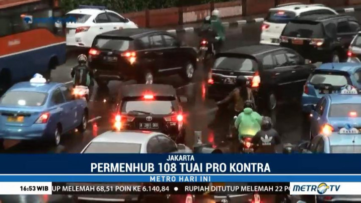 Aturan Main Taksi Daring