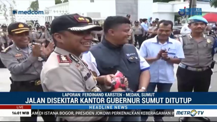 Buruh Medan Gelar Aksi Damai dan Olahraga Bersama Polisi