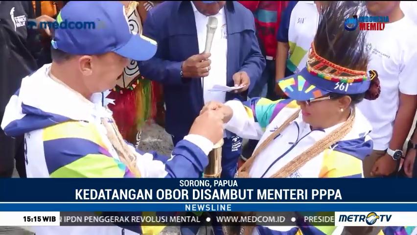 Menteri PPPA Sambut Api Obor Asian Games 2018 di Sorong