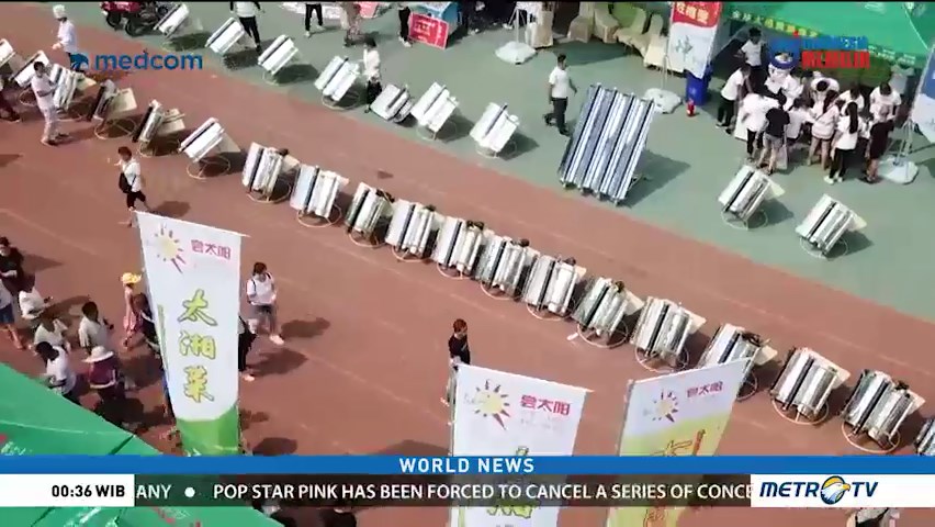 Solar Cookout Aims to Cut Carbon