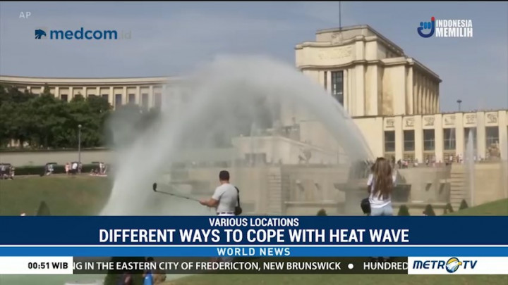 Tourists, Europeans Find Different Ways to Cope with Heat Wave