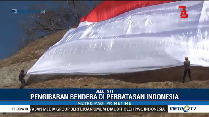 Polres Belu Bentangkan Bendera Merah Putih Raksasa di Perbatasan