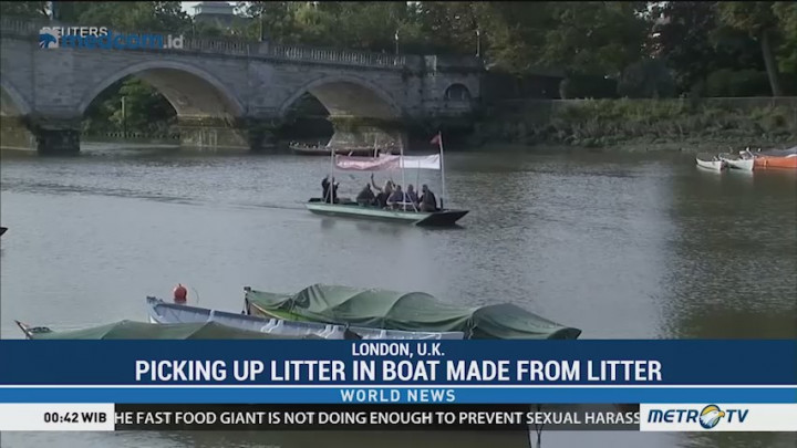 Picking Up Litter in Boat Made from Litter