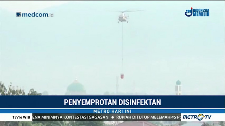 Tim Gabungan Semprotkan Disinfektan di Balaroa