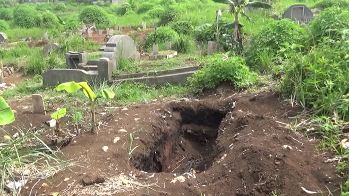 Ratusan Jenazah di TPU Khusus COVID-19 Dipindahkan Keluarga