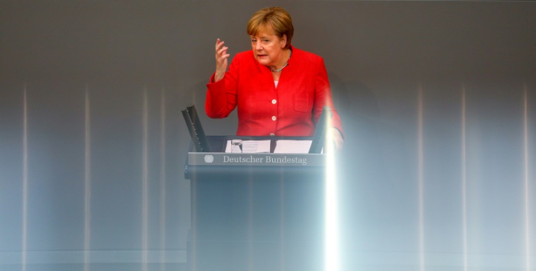 Merkel Warns Trump against Trade War over Car Tariffs Threat