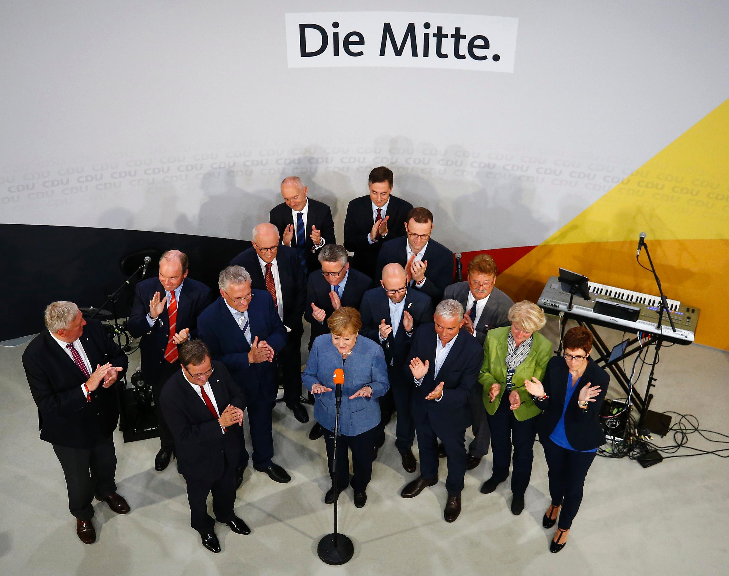 Merkel Wins Fourth Term, Hard Right Gains Foothold in Parliament