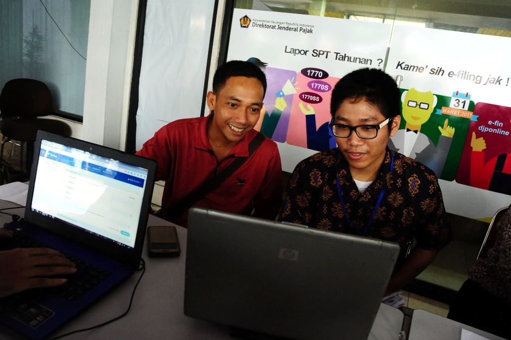 <i>Tax Amnesty</i> dan Gerbang Reformasi Pajak