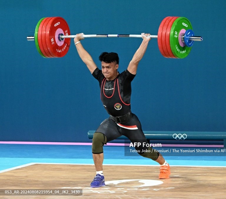 Breaking News: Lifter Rizki Juniansyah Persembahkan Medali Emas Sekaligus Pecahkan Rekor Olimpiade!