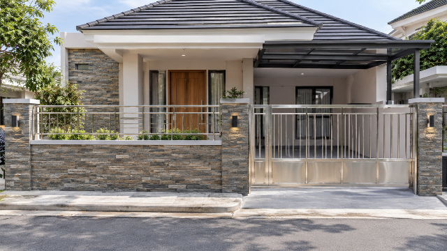 Pagar stainless dengan batu alam